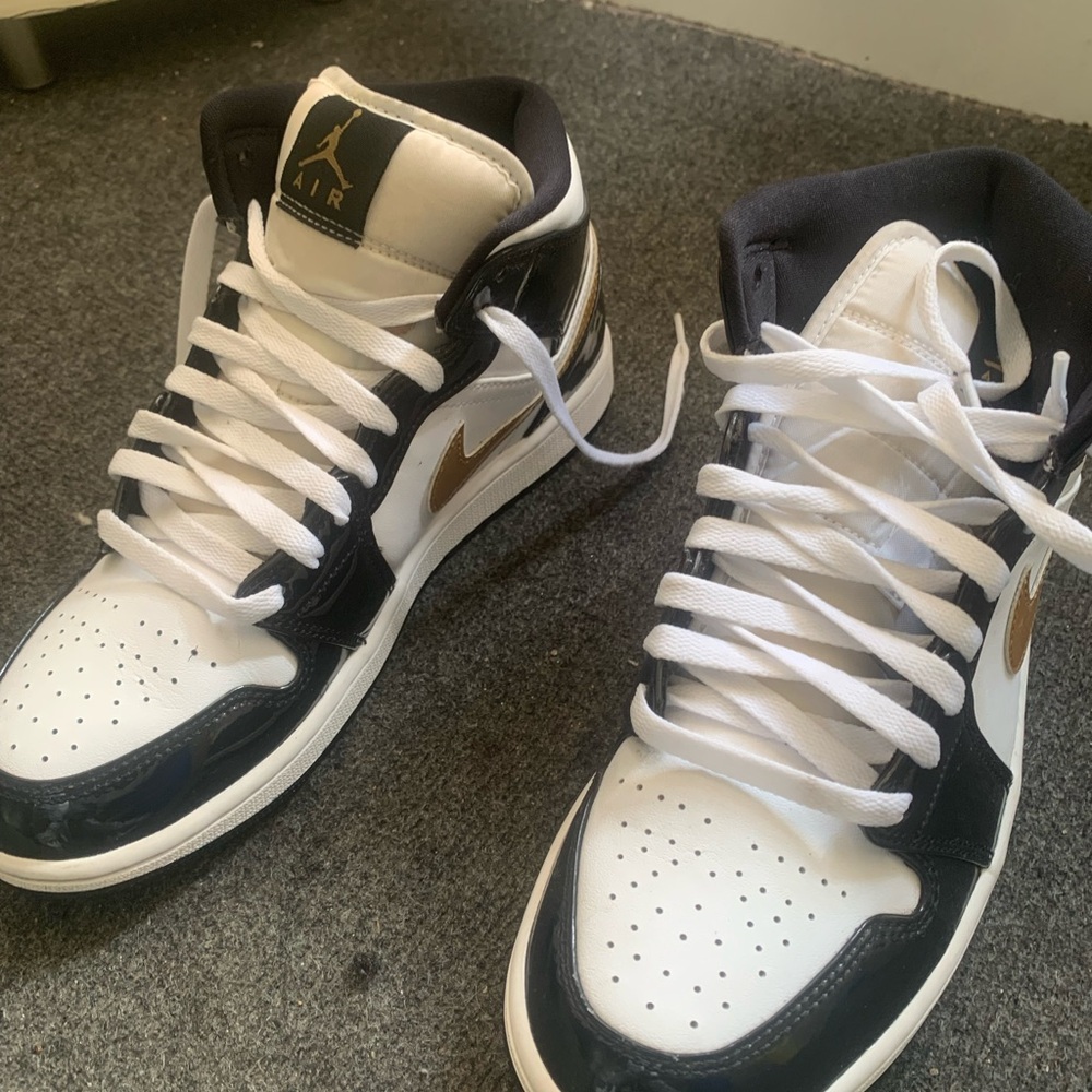 Nike Black, White, and Gold Sneakers